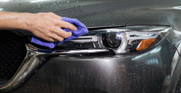 Car Wash And Cleaning At Professional Auto Service Station. Croo